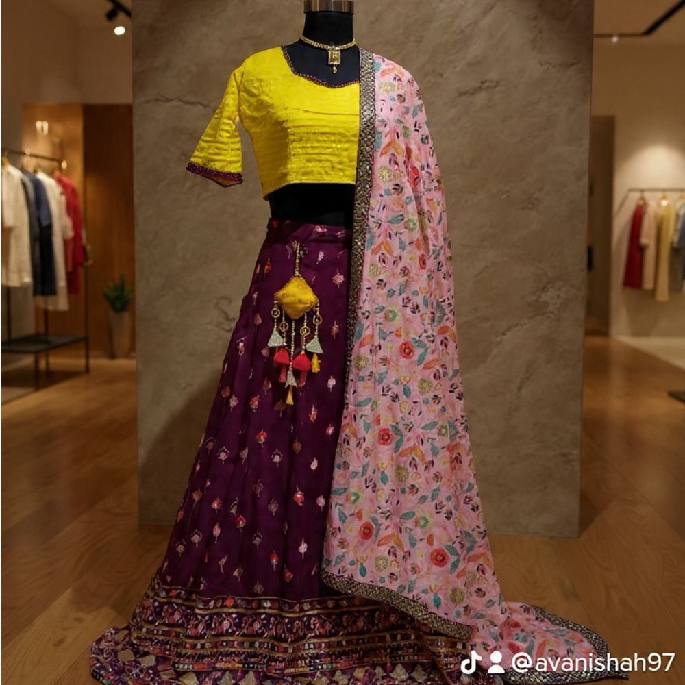Yellow Blouse with Purple Embroidered Lehenga and Pink Floral Dupatta